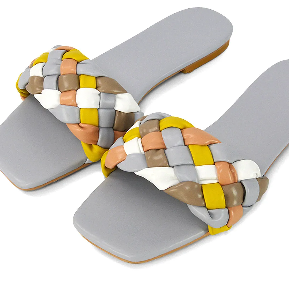 DARCIE WOVEN STRAP SQUARE TOE FLAT SLIDER SANDAL IN BLACK MULTI SYNTHETIC LEATHER