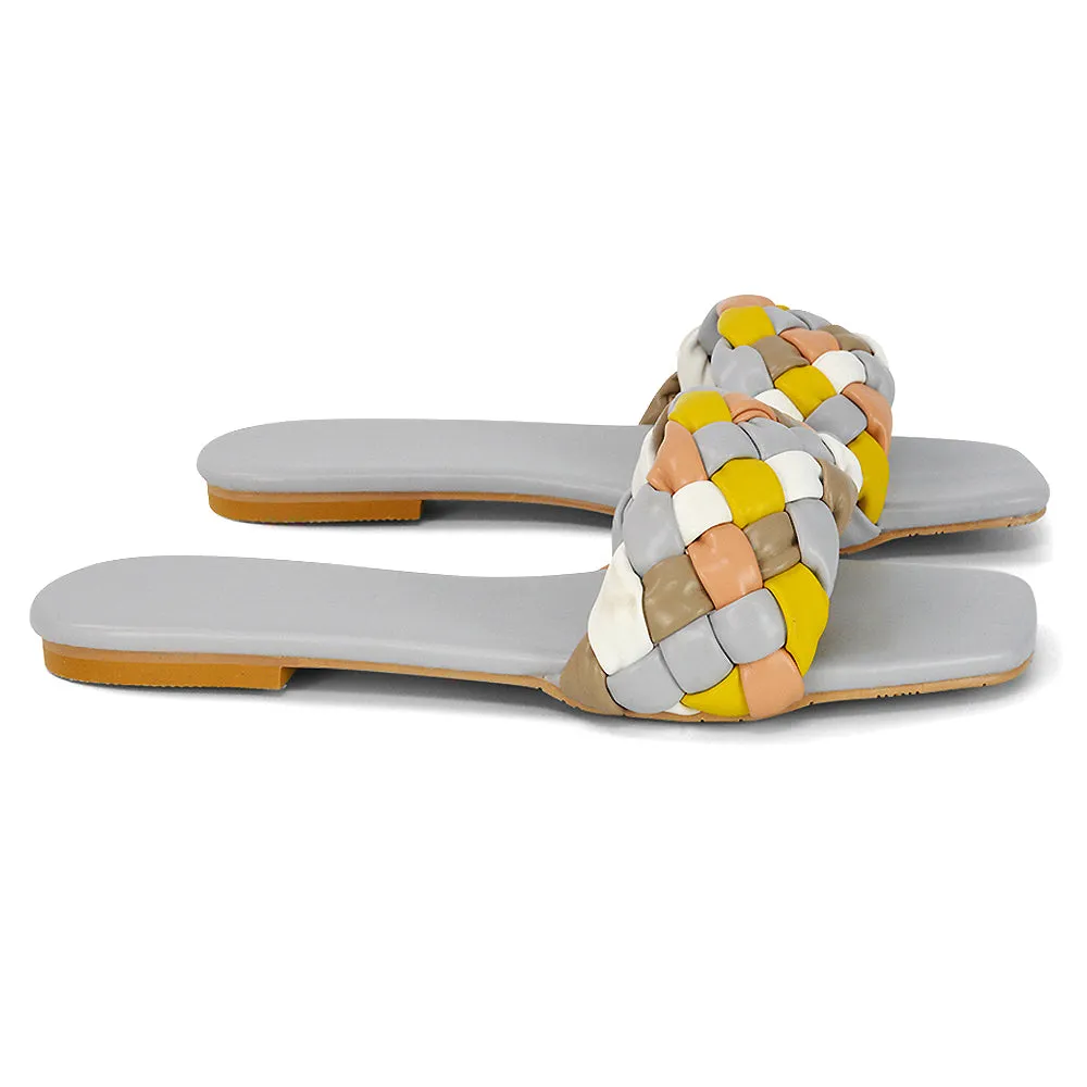 DARCIE WOVEN STRAP SQUARE TOE FLAT SLIDER SANDAL IN BLACK MULTI SYNTHETIC LEATHER