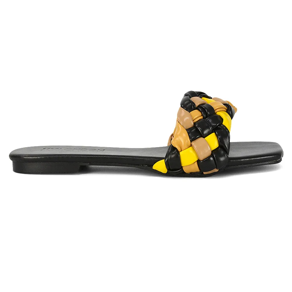 DARCIE WOVEN STRAP SQUARE TOE FLAT SLIDER SANDAL IN BLACK MULTI SYNTHETIC LEATHER